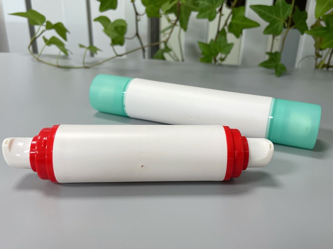 Jl-Ab121 Travel Friendly Size Vacuum Cosmetic Bottle Double End Double Head PP 10ml 15ml